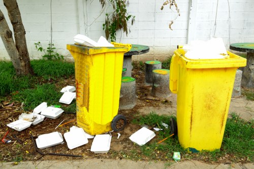 Community members participating in rubbish collection